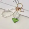 Chaveiro Pingente de Tulipa com Inlay de Diamante em Argila Cerâmica Transfronteiriço Pingente Criativo de Flor de Strass Corrente de Pérola para Bolsa Chaveiro