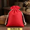 Bolsa de embalaje pequeña de brocado para la suerte al por mayor de fábrica bolsa de tela roja Bolsa de regalo antigua bolsa de la suerte con logo impreso