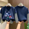 Camiseta de manga larga para niño 2026 nuevo modelo, camiseta básica de dibujos animados para niño, camiseta interior de algodón puro a rayas para otoño, estilo primavera y otoño