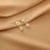 Brincos de Clipe para Velas de Mosquito para Mulheres Sem Orelhas Furadas, Brincos de Pérola de Alta Qualidade, Brincos Estilo Francês Atacado, Luxo Leve Ins, Simples e Elegante