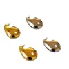 Pendientes de latón chapados en oro de alta calidad con forma de gota de agua hueca, lisa, con personalidad de nicho exagerada de Europa y Estados Unidos