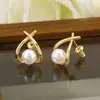 Pendientes Pequeños Luo Chen de Venta Caliente Transfronteriza, Incrustación Cruzada de Perlas Artificiales, Simples, Modernos, Exquisitos, Versátiles Pendientes de Botón para Mujer