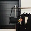 Bolso de Leopardo de Nicho Otoño e Invierno 2025 Nueva Moda Correa Ancha para el Hombro Bolso Cruzado Bolso Cuadrado Pequeño Simple de Alta Gama Maillard