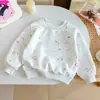 Moletom Doce Estilo Coreano para Meninas 2026 Outono Nova Chegada Fofo Estampa de Desenho Animado de Bebê Casual Versátil Top Tendência