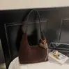 Bolsa Feminina de Design Único de Nicho Transfronteiriça Outono/Inverno 2025 Nova Bolsa Tote de Grande Capacidade Bolsa de Ombro para o Dia a Dia Tendência