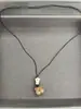 Collar de pez y oso de madera 2026 nuevo estilo vintage colgante con cordón cadena para clavícula diseño de nicho joyería al por mayor