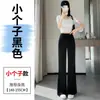 Foto real de los nuevos pantalones acampanados de satén y seda helada para el verano de 2026, pantalones casuales de pierna ancha de acetato de cintura alta, pantalones largos para mujer