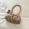 Bolso de mano de lunares estilo coreano, relajado y elegante, un nuevo diseño 2026, perfecto para el trabajo, los desplazamientos y los viajes.