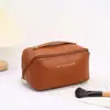 Bolsa de cosméticos transfronteriza, bolsa portátil de cuidado de la piel para viajes, bolsa tipo almohada de gran capacidad, bolsa de almacenamiento de artículos de tocador para viajes, venta al por mayor de fábrica