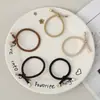 Elástico de cabelo básico de metal com nó estilo coreano, simples e fresco, versátil para rabos de cavalo e coques, corda de cabelo durável