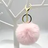 Llavero creativo de pompón de pelo anti-conejo 8CM colgante para bolso de mujer DIY zapatos y sombreros ropa colgante de pompón de pelo joyería