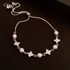 Pulsera de Hilo con Flor de Zircón Súper Brillante en Forma de Diamante y Perla, Pulsera de Lujo Ligero y de Gama Alta, Joyería de Mano Estilo Retro Francés