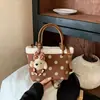 Bolsa de mão versátil de bolinhas para nicho transfronteiriço, nova moda outono 2026, bolsa tipo saco de ombro único para mulheres, bolsa transversal versátil