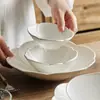 Juego de Tazones y Platos con Forma de Pétalo Dehua de Fábrica para Uso Doméstico 2026 Nuevo Club de Gama Alta Hotel Restaurante Tazón para Ensalada Cerámico Tazón para Sopa y Fideos