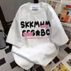 Camiseta de Verano Estilo Universitario Cuello Redondo Holgada Manga Corta Mismo Estilo para Hombres y Mujeres Oversize Versátil de Moda Marca Letra Ins Top