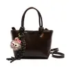 Bolso bandolera versátil de moda nuevo 2026, bolso tipo cubo súper popular, bolso pequeño retro Melard, lindo para mujer