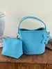 Bolso tipo cubo retro simple Shuai Mi Jia para mujer, nuevo bolso de moda para el hombro o cruzado de principios de otoño de 2026, bolso casual para el día a día