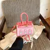 Nova Bolsa Feminina de Platina Outono 2026 Estilo Coreano PU Color-Block Fofa Mini Bolsa Infantil com Pingente, Porta Fone de Ouvido e Porta Batom