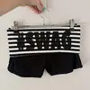 Conjunto de shorts de mujer Y2K vintage de verano, top de tubo estampado de leopardo a rayas, pantalones cortos ajustados con estampado de letras, estilo callejero versátil