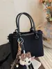Bolso Cubo Portátil Retro de Nicho Transfronterizo para Mujer Nuevo Otoño e Invierno 2025 Bolso de Hombro Único Cruzado Bolso de Hombro Cruzado Informal de Moda para Viajar