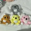 Máquina de Garra de 4 pulgadas al por mayor Juguetes de Peluche Premium Llaveros Colgantes Pequeños Lindos
