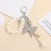 Llavero de Cadena de Perlas de Aleación con Diamantes Completos de Mariposa Grande Transfronterizo Europeo y Americano Llavero Exquisito para Bolsa Estilo K Exquisito