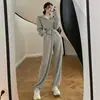 Traje nuevo de Primavera y Otoño elegante moda casual adelgazante cremallera cárdigan suéter pantalones de pierna ancha traje de dos piezas para mujer