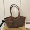 Bolso grande de mujer transfronterizo, nueva colección otoño 2026, bolso tote tejido de nicho para ir al trabajo, bolso de hombro para el día a día