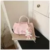 Elegante y versátil minibolso tote, nuevo modelo 2026, bolso de hombro y cruzado, bolso de mano casual de nicho para el día a día