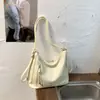 Bolsa tote simples de grande capacidade para mulheres, novo estilo primavera 2026, bolsa de mão estilosa casual e moderna para trabalho e deslocamento, bolsa de ombro