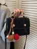 Bolso de Gama Alta de Nicho Estilo Británico Maillard 2026 Bolso Cruzado de Moda Nueva Bolso de Mano Texturizado Bolso Cuadrado Pequeño para Mujer