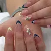 Unhas postiças 3D florais estilo francês, amarelas e azuis com bolinhas, em formato amendoado curto, reutilizáveis