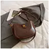 Bolso de Axila de Aspecto Retro de Alta Calidad para Mujer 2025 Nuevo Bolso Cubo Simple Textura de Nicho Hombro Único Cruzado Bolso para Teléfono Móvil