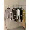Té Verde Limón Otoño Nuevo Estilo Coreano Simple Versátil Adelgazante Alta Elasticidad Suave para la Piel Camiseta de Manga Larga con Cuello Henley 11013