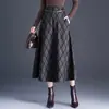 Moderna falda de cuadros línea A para mujer, nuevo estilo otoño e invierno 2026, elegante falda midi de cintura alta acampanada estilizada para mujer
