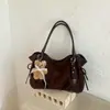 Bolsa de camurça para mulheres, nova coleção outono/inverno 2026, bolsa de ombro retrô, adequada para trabalho e deslocamento, grande capacidade, estilo bolsa almofada
