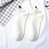 Nuevos calcetines invisibles de algodón para mujer de primavera y verano, cara sonriente de ojos grandes, bordado de dibujos animados divertidos, calcetines de barco para hombre y mujer, venta al por mayor