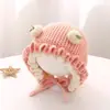 Bonitos y adorables gorros de otoño e invierno para niños, con diseño de poner, material de punto y una serie de dibujos animados, que brindan abrigo y protección para los oídos para bebés y niños pequeños.