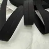 Venda Direta de Fábrica de Fita Elástica Preta de Poliéster, Tiras Elásticas Dobradas para Bolsas, Mochilas Escolares, Bagagens e Tiras de Borda Atacado