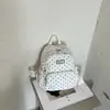 La nueva mochila de estilo coreano ins estilo universitario de lunares de Shuai Mi, linda mochila de nicho para estudiantes de secundaria y preparatoria