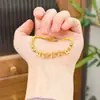Tienda de Oro Mismo Estilo Arena Dorada Cuentas Disco Estrella de Cinco Puntas Pulsera de Cuentas de Sarga Diseño de Moda para Mujer Joyería de Mano de Alta Gama