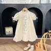 Vestido de encaje bordado con lazo de alta gama para niña, estilo verano 2026, cuello alto, elegante vestido de princesa de manga corta para niños, moderno