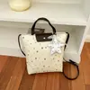 Otoño 2026 Nuevo Estilo Estilo ins Versátil Bolso de Mano de Estrella para Viajes Diarios Moda para Mujer Gran Capacidad Bolsa de Compras Bolsas de Mujer al por Mayor
