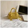 Bolso tipo almohada de moda 2026 Nuevo modelo de primavera, Bolso cruzado de un solo hombro único y elegante, Bolso popular casual texturizado para el hombro