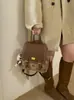 Bolsa de Mão Vintage de Nicho 2026 Novo Modelo Versátil Bolsa Transversal Mochila para Estudo Escola Trajeto para Mulheres