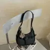 Bolso de Axila Francés para Mujer 2026 Nuevo Bolso de Luna de Grano de Lichi de Gama Alta Versátil Casual de Hombro Único