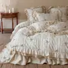 Laço Romântico Francês Conjunto de Quatro Peças de Lã de Leite Esculpida para Inverno Cobertura de Edredom de Renda de Camada Dupla Fleece de Coral Colcha Espessa