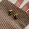 Pendientes vintage Maillard de otoño e invierno para mujer, nuevo modelo popular 2026, diseño de nicho, pendientes con sensación elegante y de alta gama