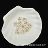 Camellia con Borde Dorado Accesorios Hechos a Mano DIY Pulsera de Acrílico Transparente Estampada en Oro Joyería Adorno para Colgar en el Coche Venta al por Mayor Popular en Tiktok