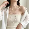 Versátil collar de perlas estrelladas multicapa para mujer, cadena para la clavícula de perlas, cadena decorativa de alta gama en capas para suéter